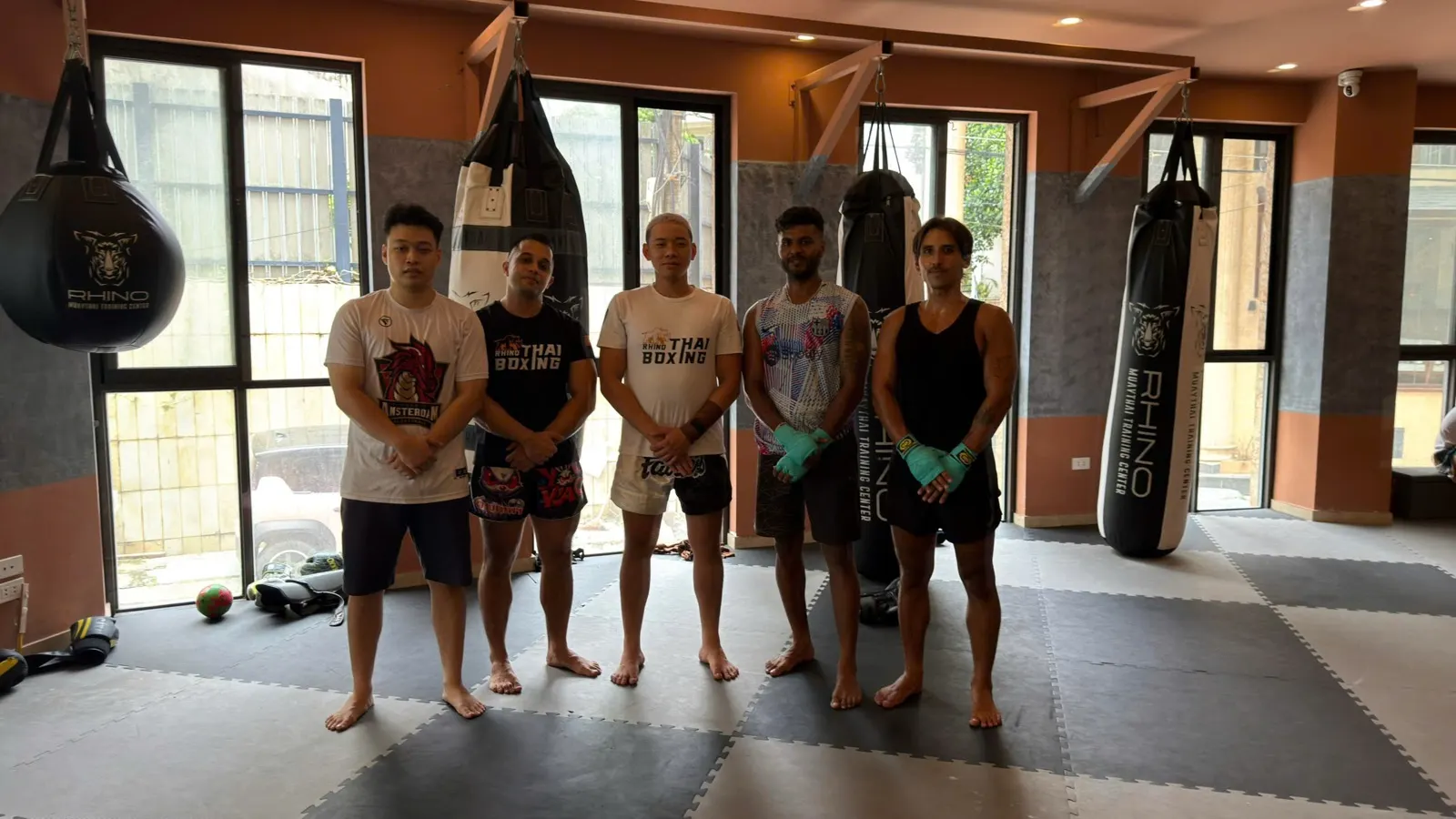 A small group class training on the pads at Rhino Thai Boxing Gym