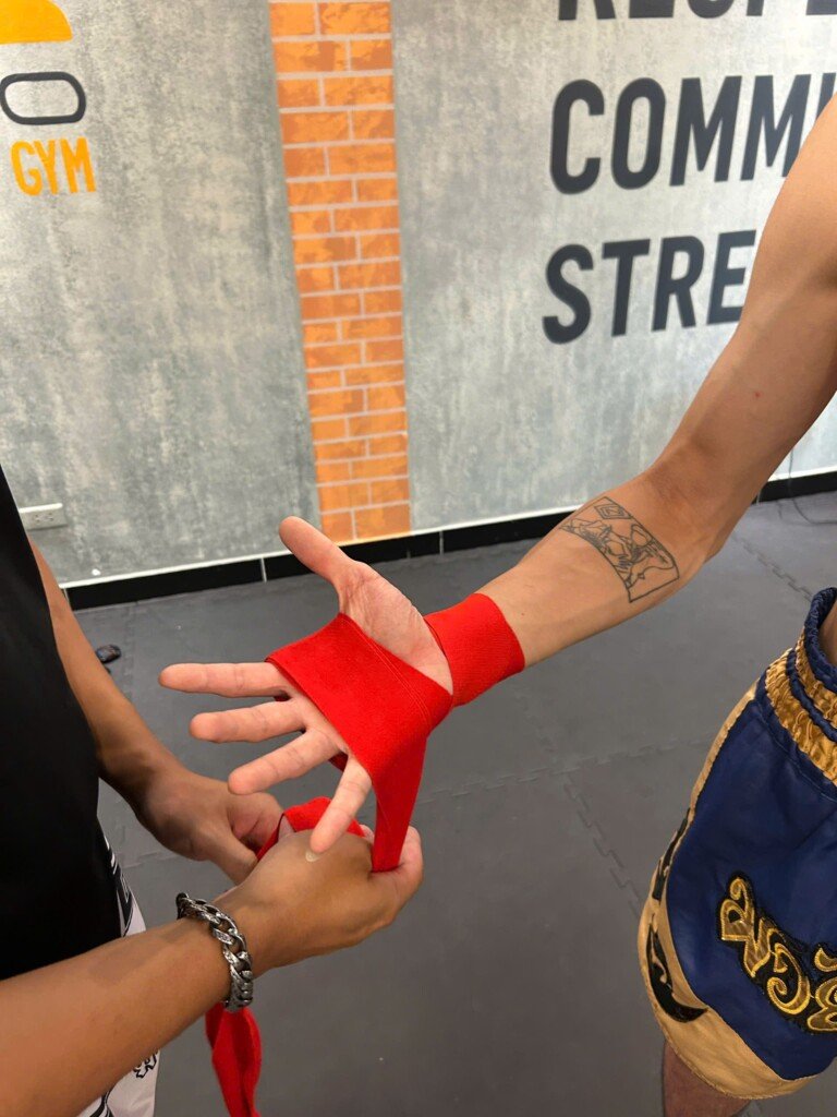 Close-up from above of the passes between the fingers and across the knuckles