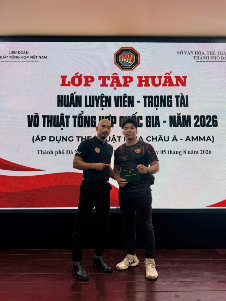 RHINO coach receiving the national MMA coach certification in Vietnam, August 2026